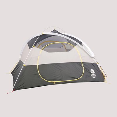 SIERRA DESIGNS<sup>&reg;</sup> Nomad 4 Tent- This spacious tent is built with a high-clearance ceiling to accommodate up to 4 campers. Setup is quick and sturdy with the tent’s aluminum 3-pole system and 68-denier poly taffeta rain fly for a reliable shelter that’ll withstand bad weather. Endless organization pockets keep everyone’s essentials off the floor and within reach. The 2-door, 2-vestiblue design offers plenty of protection and storage for larger or muddy gear while keeping access easy for all.